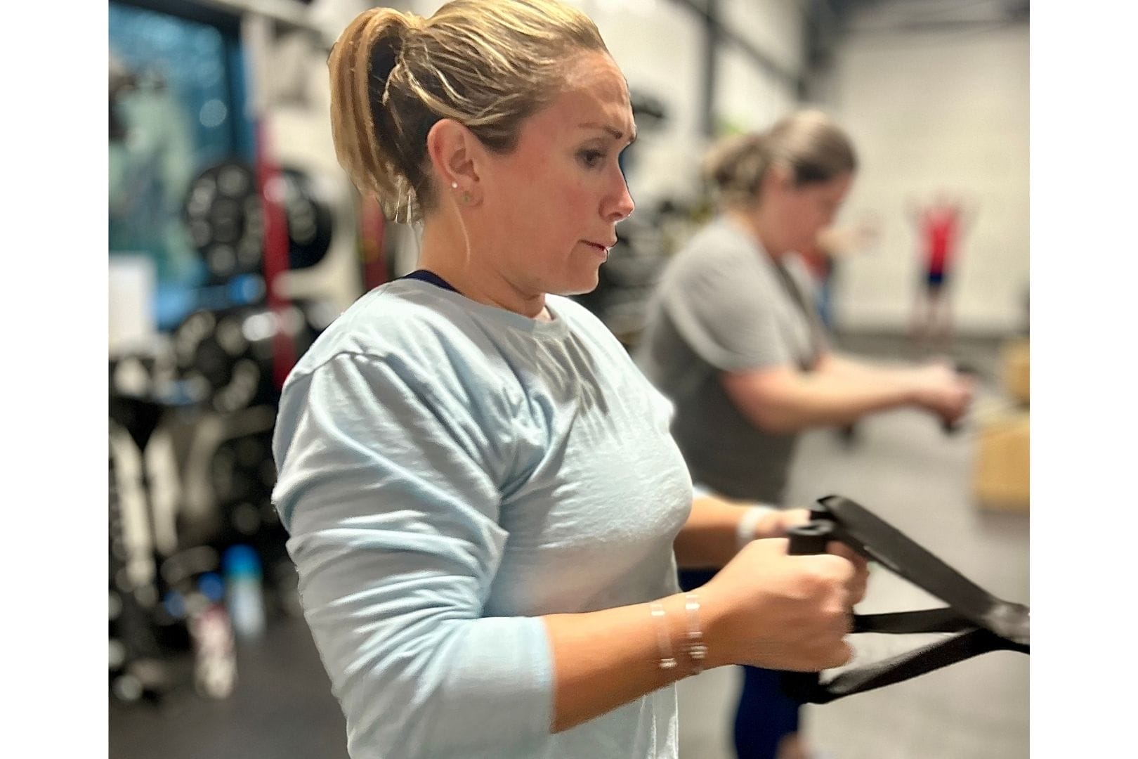 Women training with TRX equipment at TrvFit Georgetown